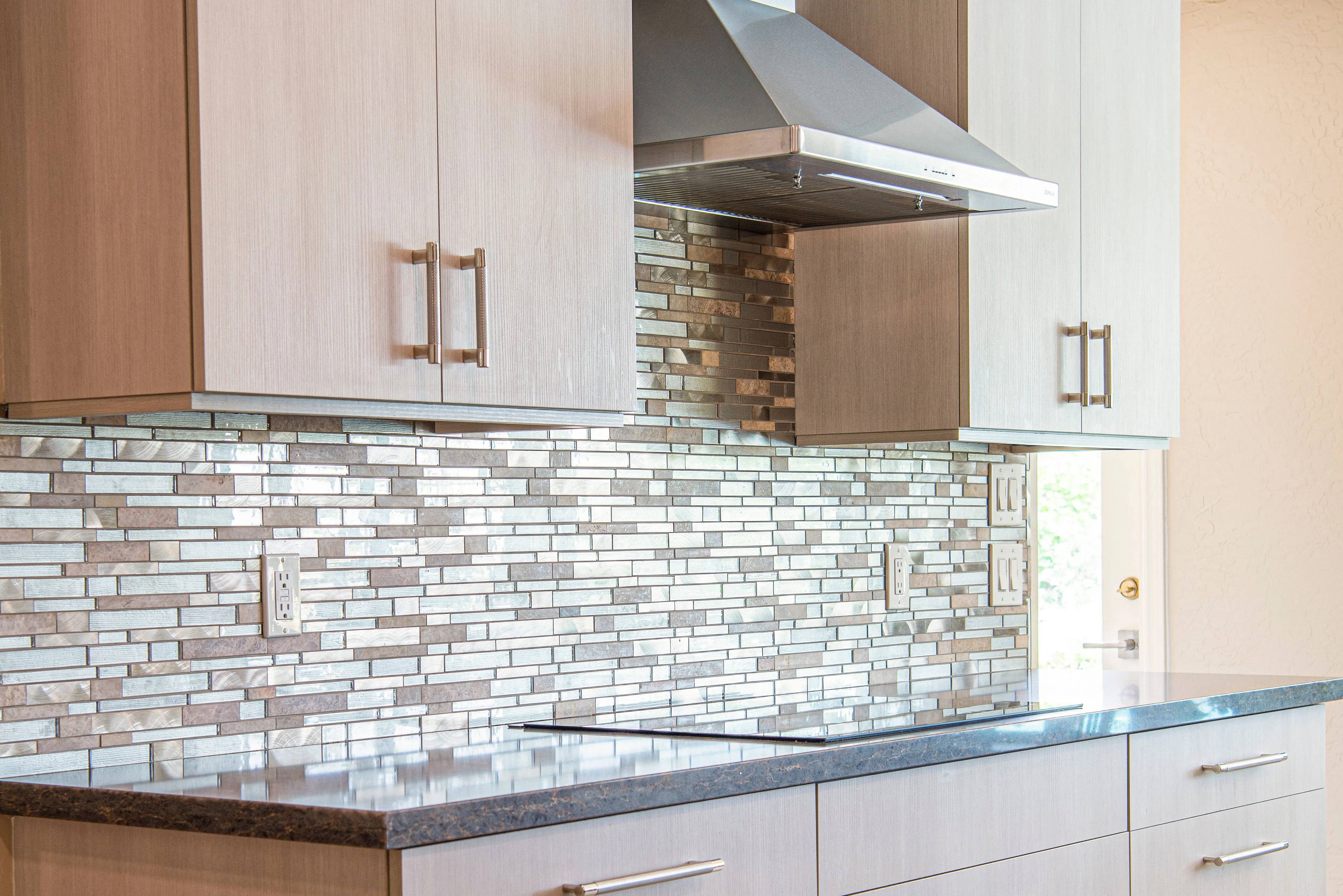 Stylish modern kitchen with elegant cabinets and sleek backsplash design